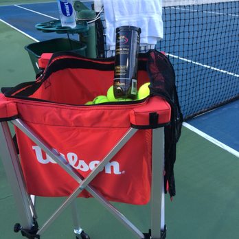 Kirk Munroe Park - I have all of the essentials for tennis class during hot summer months including bug spray (not seen here in this photo)! - Parks Near Me - Miami, Florida