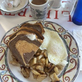 The Gem Diner - Two 2 Eggs, Home Fries and Toast over easy with rye toast - Diners Near Me - Syracuse, New York The Gem Diner - Two 2 Eggs, Home Fries and Toast over easy with rye toast - Diners Near Me - Syracuse, New York