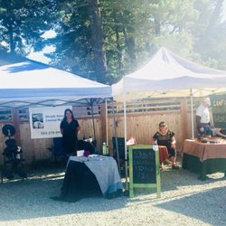 Deeply Kneaded Coastal Massage - Chair massage booth at the manzanita Friday market