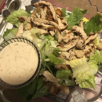 Amedeos - a plate of salad and dressing - Pizza Near Me - Holyoke, Massachusetts