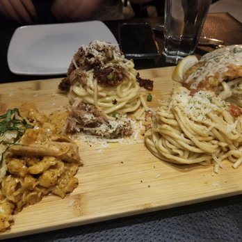 Dorsia - Left to right: Piccante, Duck Carbonara, Roma Fresca, Chicken Picatta - Italian Near Me - Milwaukee, Wisconsin Dorsia - Left to right: Piccante, Duck Carbonara, Roma Fresca, Chicken Picatta - Italian Near Me - Milwaukee, Wisconsin