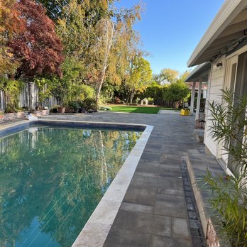 Precision Paving - a pool in a backyard - Masonry/Concrete Near Me - East Palo Alto, California Precision Paving - a pool in a backyard - Masonry/Concrete Near Me - East Palo Alto, California
