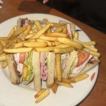 Manor Grill & Bar - Club sandwich and fries - American Near Me - San Leandro, California Manor Grill & Bar - Club sandwich and fries - American Near Me - San Leandro, California