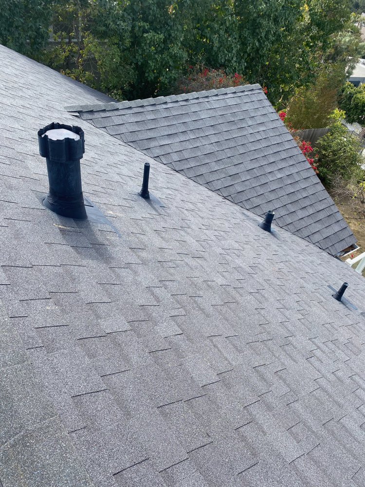 Slide of Rain Tec Roofing