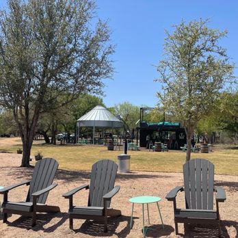 Hooks Bar - a group of chairs in a park - Beer Bar Near Me - Buchanan Dam, Texas