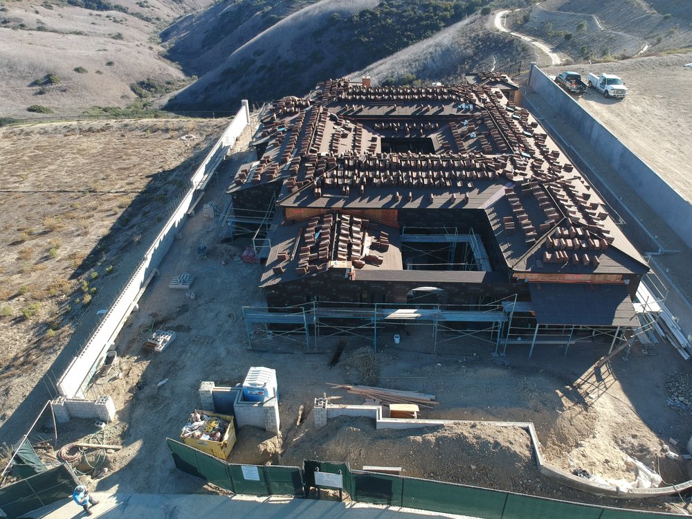 Slide of Coastal Roofing