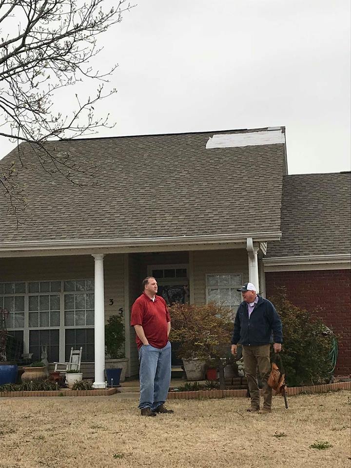 Slide of Grizzly Roofing