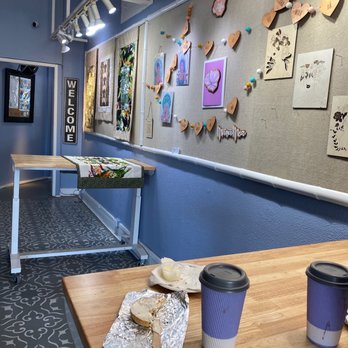 Aloha'n Paradise - a table with a sandwich and two cups of coffee - Coffee & Tea Near Me - Hanapepe, Hawaii