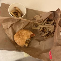 Little cheese burger and French fries. Little cheese burger and French fries.
