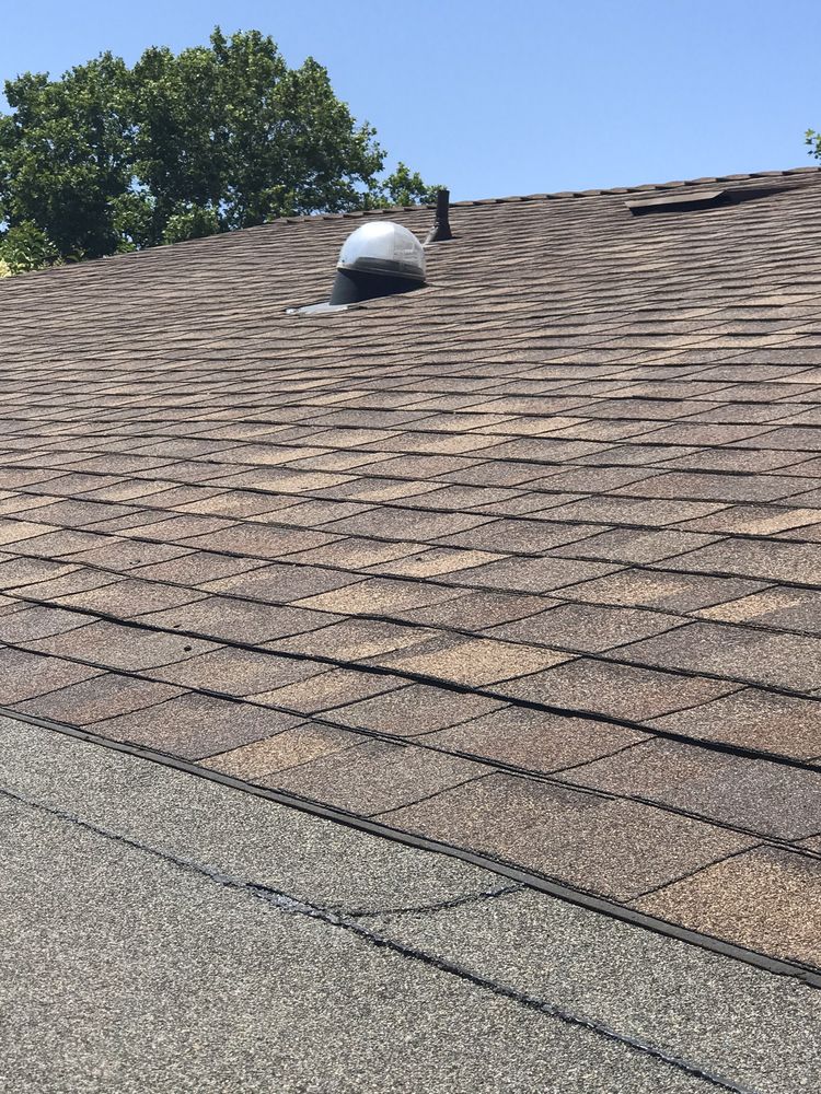 Slide of AV Roofing & Construction