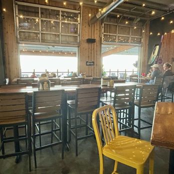 The Weekend Lakeside Bar & Grill - Open garage doors looking out at the lake - Bars Near Me - Ashland, Nebraska The Weekend Lakeside Bar & Grill - Open garage doors looking out at the lake - Bars Near Me - Ashland, Nebraska