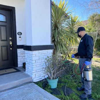 Family Pest Solutions - Applying residual barrier around the house - Pest Control Near Me Family Pest Solutions - Applying residual barrier around the house - Pest Control Near Me