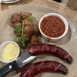 Huckleberry's Cafe - Bison sausages baked beans, and potatoes.