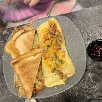 Andy's North - "Kitchen Sink" Omelette, hash browns, toast and homemade raspberry jam - Lounges Near Me - Pasco, Washington Andy's North - "Kitchen Sink" Omelette, hash browns, toast and homemade raspberry jam - Lounges Near Me - Pasco, Washington