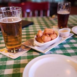 The Bull & Bear Tavern & Eatery - Cheese curds and house sauce.