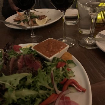 River & Fort - Steak over salad with tomato/bacon vinaigrette. - Bars Near Me - SAINT AUGUSTINE, Florida River & Fort - Steak over salad with tomato/bacon vinaigrette. - Bars Near Me - SAINT AUGUSTINE, Florida