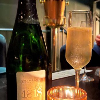 Daisy Lounge - A bottle of 1818, why not! - Lounges Near Me - Austin, Texas