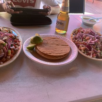 Mariscos Nayarit - La nueva orden. Ceviche de camaron, pescado, and pulpo.  Half raw (cooked in lime) shrimp. Half cooked shrimp.  Raw was better. - Mexican Near Me - Lynwood, California