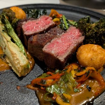 THE CHASTAIN - Prime Spinalis. $65. Olive oil fried brassicas, chevre croquettes, black garlic romesco, grilled sweet peppers. - Diners Near Me - Atlanta, Georgia THE CHASTAIN - Prime Spinalis. $65. Olive oil fried brassicas, chevre croquettes, black garlic romesco, grilled sweet peppers. - Diners Near Me - Atlanta, Georgia