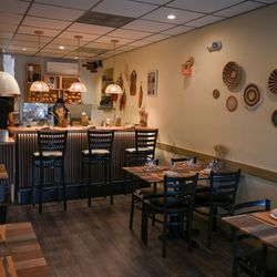 Trattoria Bella Napoli - The pizza oven and part of the dining space.