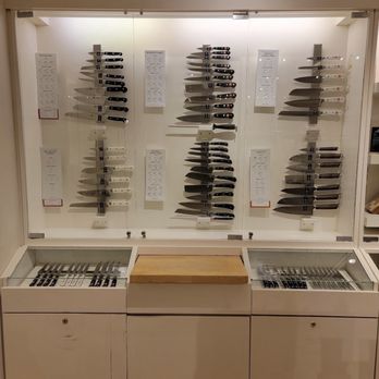 Williams-Sonoma - a display of knives in a glass case - Kitchen & Bath Near Me - Edina, Minnesota
