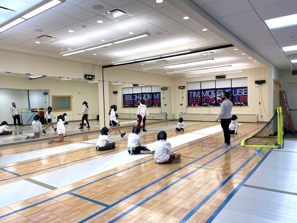 Tim Morehouse Fencing Club - Stamford Logo