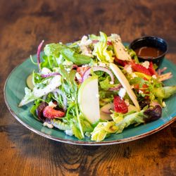 Red Apple Kitchen - Strawberry Apple Salad is a perfect compliment to your meal. A farm-fresh, seasonal salad made for the summer for limited time only.