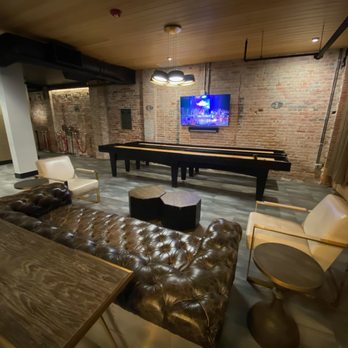 Buffalo Rose - There are seating areas on either side of the entrance with game table and close circuit TV. - Bars Near Me - Golden, Colorado Buffalo Rose - There are seating areas on either side of the entrance with game table and close circuit TV. - Bars Near Me - Golden, Colorado