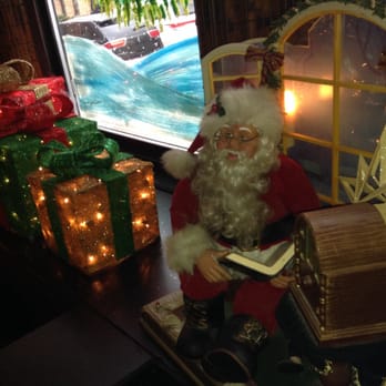 McGuinness's Bar - santa reading a book - Sports Bars Near Me - Sunnyside, New York McGuinness's Bar - santa reading a book - Sports Bars Near Me - Sunnyside, New York