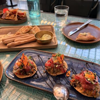 Modí - Ahi Tuna tostadas, crispy mini tortillas topped with Aji tuna tartare caponata drizzled with homemade balsamic glaze - Italian Near Me - San Francisco, California