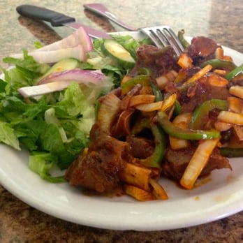 Luubaan Restaurant - Goat short ribs and the salad that comes with it. - African Near Me - Calgary, Alberta Luubaan Restaurant - Goat short ribs and the salad that comes with it. - African Near Me - Calgary, Alberta