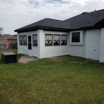 Premier Painting - After, back side of house with porch - Painters Near Me