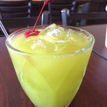 Bieke's Bistro - Green Drink (Midori, melon liquor) with Pineapple Juice, very sweet - Puerto Rican Near Me - Vieques, Puerto Rico