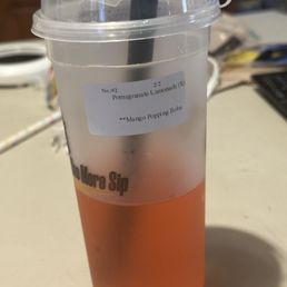 Pomegranate Lemonade with mango popping boba Pomegranate Lemonade with mango popping boba