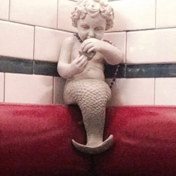 Neptune Oyster - Neptune hanging out and enjoying a clam or mussel - Seafood Near Me - Boston, Massachusetts Neptune Oyster - Neptune hanging out and enjoying a clam or mussel - Seafood Near Me - Boston, Massachusetts