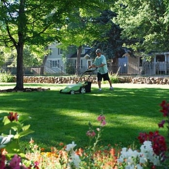 Clean Air Lawn Care - a man mowing the grass - Gardeners Near Me - Seattle, Washington Clean Air Lawn Care - a man mowing the grass - Gardeners Near Me - Seattle, Washington