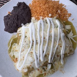 Enchiladas suiza with verde salsa along