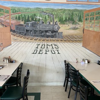 Tom's Depot - Train mural on the wall. I guess this used to be a station on the old southern pacific line along what is now foothill expressway - American Near Me - Los Altos, California Tom's Depot - Train mural on the wall. I guess this used to be a station on the old southern pacific line along what is now foothill expressway - American Near Me - Los Altos, California