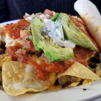 From Scratch Restaurant - Breakfast Nachos. Aka huevos rancheros with chips. This is the meal that got us in the door and boy was it worth it - Breakfast & Brunch Near Me - Carmel, California From Scratch Restaurant - Breakfast Nachos. Aka huevos rancheros with chips. This is the meal that got us in the door and boy was it worth it - Breakfast & Brunch Near Me - Carmel, California