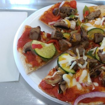 Extreme Pita - Custom Pita with baked option. Ingredients include striploin steak and onions and mushrooms and zucchini and bar be que sauce. - Sandwiches Near Me - Toronto, Ontario Extreme Pita - Custom Pita with baked option. Ingredients include striploin steak and onions and mushrooms and zucchini and bar be que sauce. - Sandwiches Near Me - Toronto, Ontario
