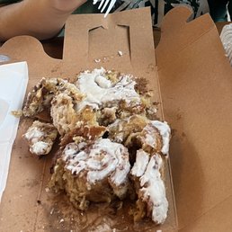 Half eaten cinnamon rolls