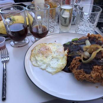 Milestone - Chicken Fried Steak - served with brunch potatoes, 2eggs, brown demi-glace gravy with grilled onions. Different, but DELICIOUS!! - American Near Me - El Dorado Hills, California Milestone - Chicken Fried Steak - served with brunch potatoes, 2eggs, brown demi-glace gravy with grilled onions. Different, but DELICIOUS!! - American Near Me - El Dorado Hills, California