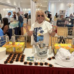 Sampling the corona Sunbrew beer w swag