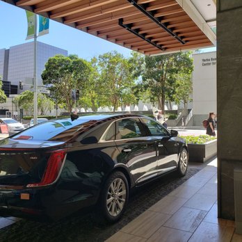 7x7 Executive Transportation - Our Cadillac XTS - L waiting for a client at the St. Regis Hotel, San Francisco. - Limos Near Me - San Francisco, California 7x7 Executive Transportation - Our Cadillac XTS - L waiting for a client at the St. Regis Hotel, San Francisco. - Limos Near Me - San Francisco, California