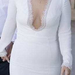 My bridal shower dress with beading on the front and sleeves that I asked Lily to put onto my black dress.