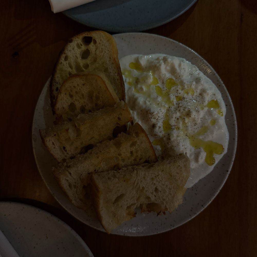 Housemade stracciatella and sourdough Housemade stracciatella and sourdough