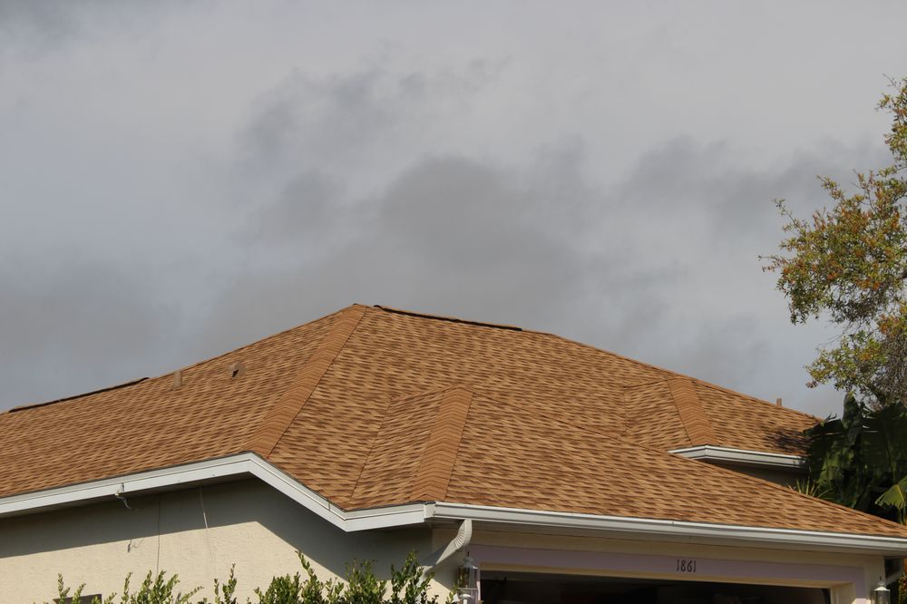 Slide of Arry's Roofing Services