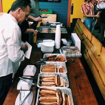 Dat Dog - Catering set up at the back of the outdoor area - Hot Dogs Near Me - New Orleans, Louisiana