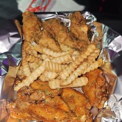 Wings and fries. Sweet chili and lemon pepper. So good