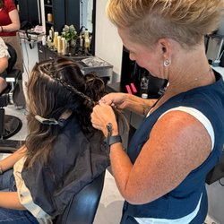 Beachy Blowout Bar & Salon - Creating an up-do.